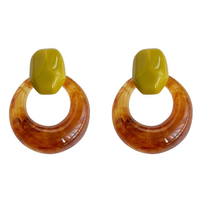 A Pair of Circular Maillard Retro Earrings Bold, Vintage-Inspired, and Niche-Style Accessories