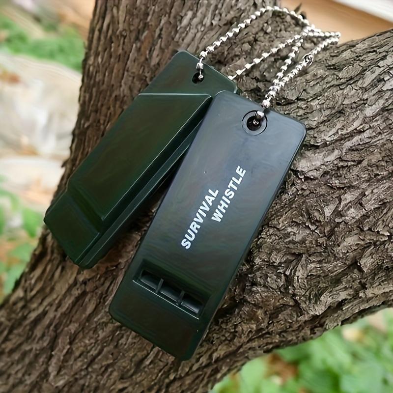 Two three-frequency outdoor sports survival whistle first aid whistle students practice whistle referee whistle travel mountaineering survival whistle treble high frequency earthquake relief whistle.