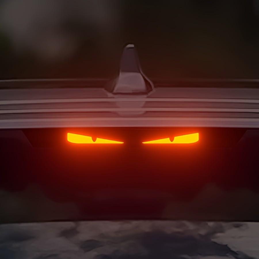 Monster evil eye car tail light sticker, flashing fangs eyes, easy-to-apply vinyl sticker, high visibility at night, fun car decoration