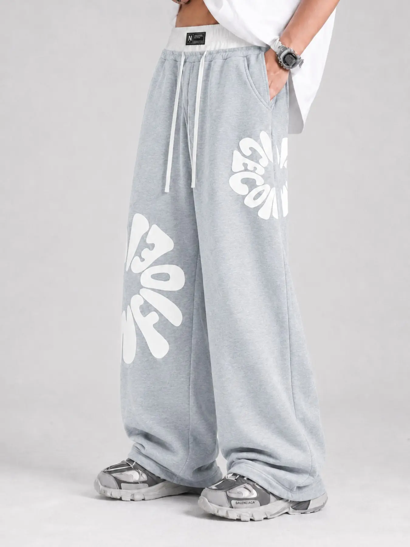 Grunge Aesthetic Unisex Oversized Track Pants, Side Surrounded Bubble Script Logo Printed Joggers, Adjustable Drawstring Relaxed Fit Baggy Trousers, Hip Hop Skate Street Daily Wear Bottoms Trending Viral On TikTok Gen Z Casual Loose Fit Floor Length Pants