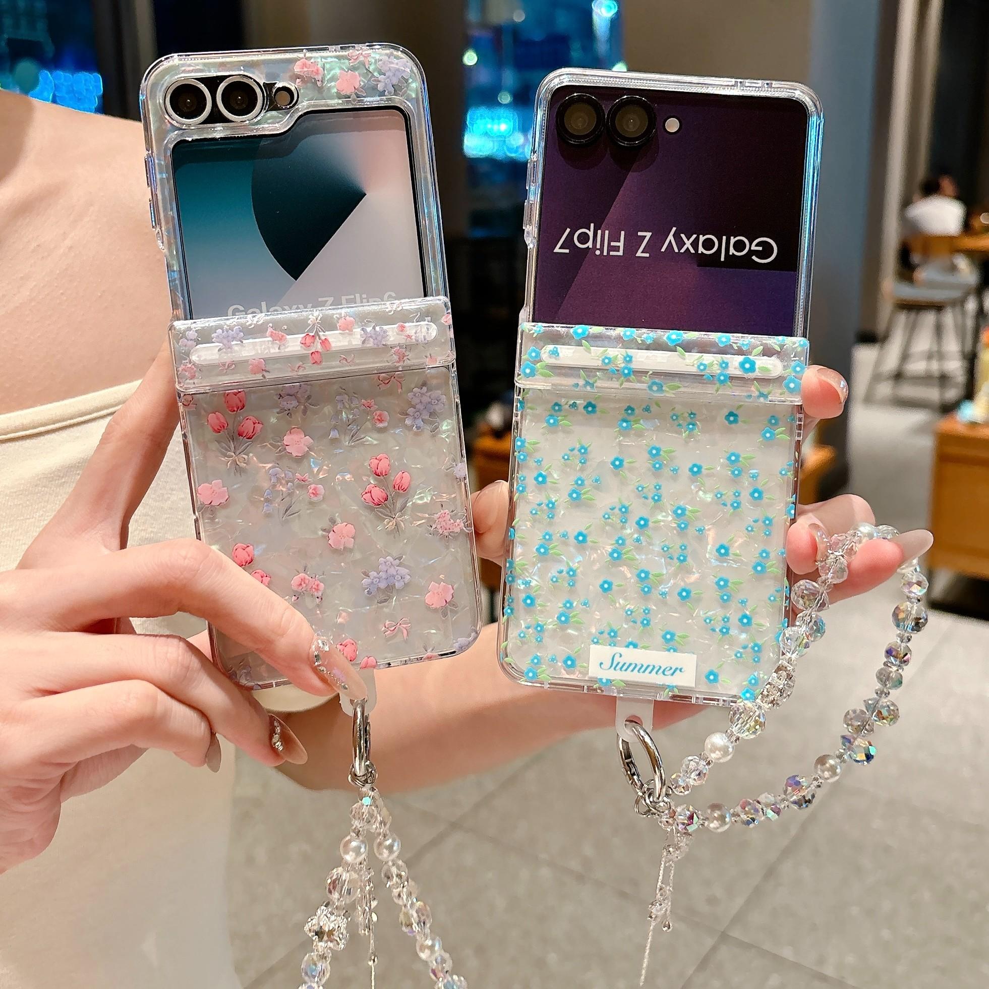 Fresh Floral & Magnetic Snap Shell Pattern Phone Case with optional wrist strap for easy carrying. for Samsung Galaxy Z Flip 5/6/7FE/7. Features a refreshing style, fashionable protection, and unique design perfect for daily use. Protective outer shell.