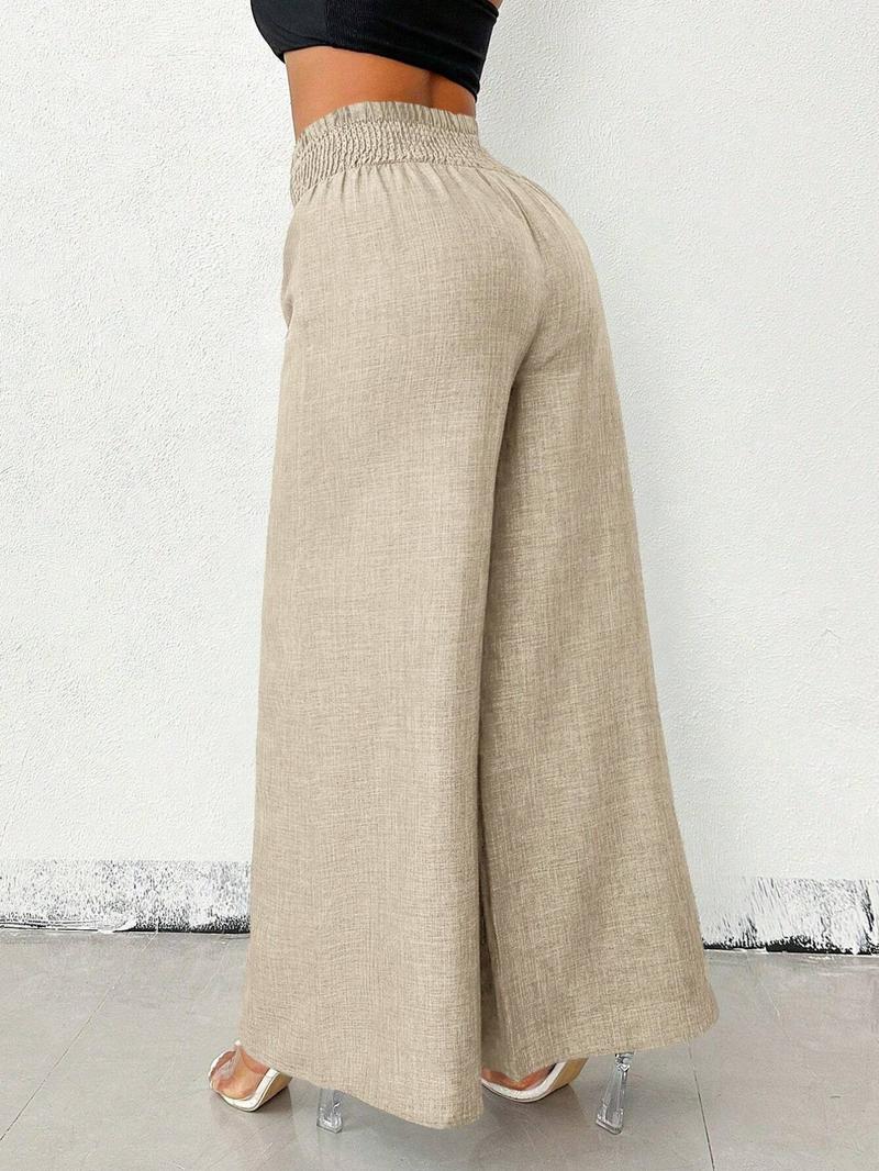 A pair of women's solid-color zipper-enclosed high-waisted stretchable loose-fitting slimming wide-leg trousers that are versatile and suitable for all occasions.