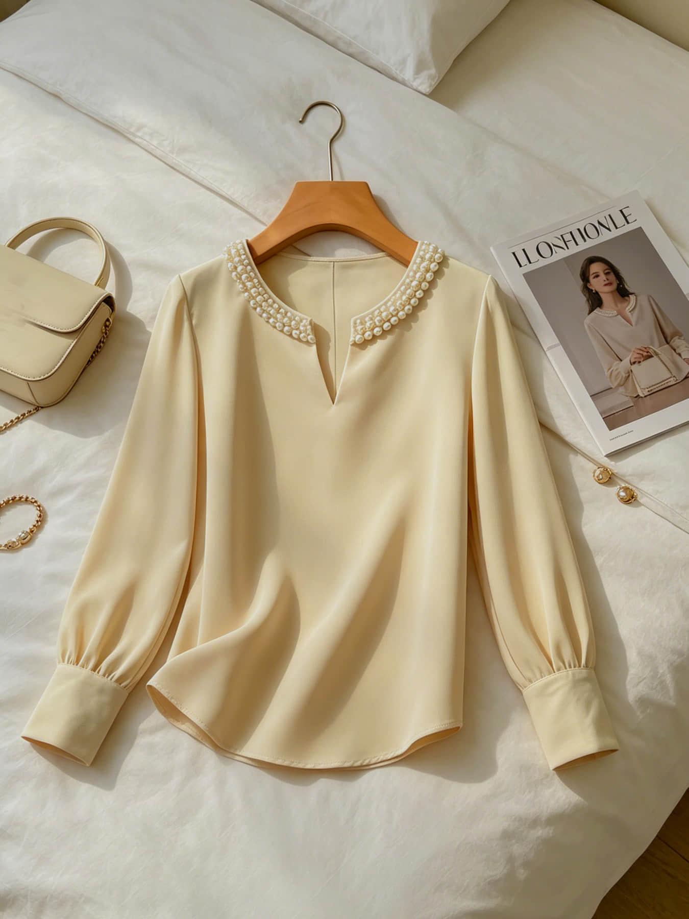 A women's pearl collar top, Blouse, with a V-neck small open neck, loose and versatile, showing off a slimming temperament. It is suitable for summer, business negotiations, customer meetings, commuting