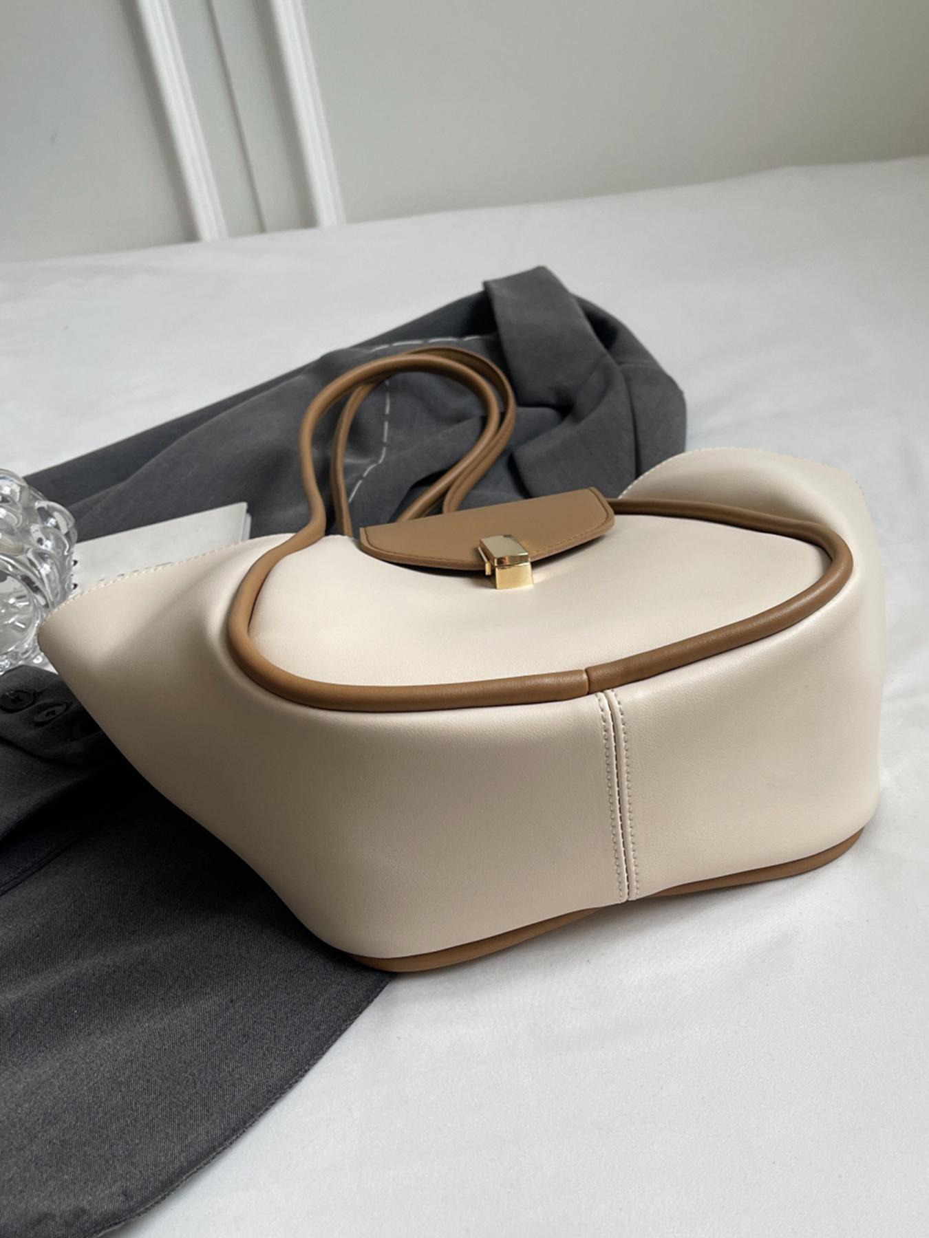 A niche and elegant shopping basket tote bag, a lock-button underarm bag, a simple solid color shoulder bag, a fashionable and textured shoulder commuter bag, a Casual Commuter Bag, suitable for daily matching, commuting and other scenarios