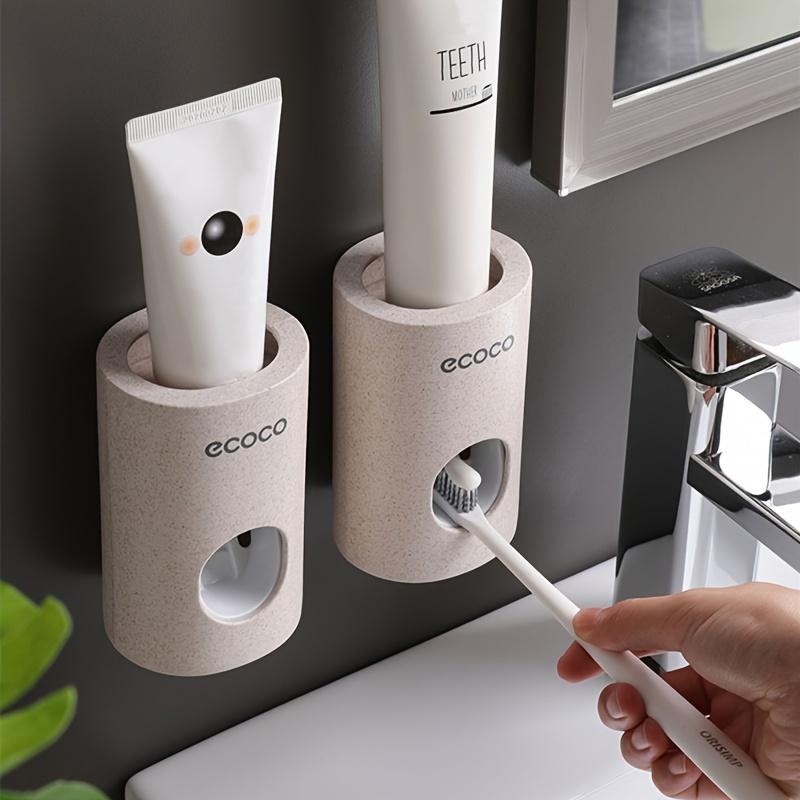 One Unit of a Self-Adhesive Toothpaste Dispenser for The Bathroom That Doesn'T Require Drilling, Is Easy to Take Apart And Clean, Allows for Easy Squeezing of Toothpaste, And Comes in White with an Automatic Dispensing Feature