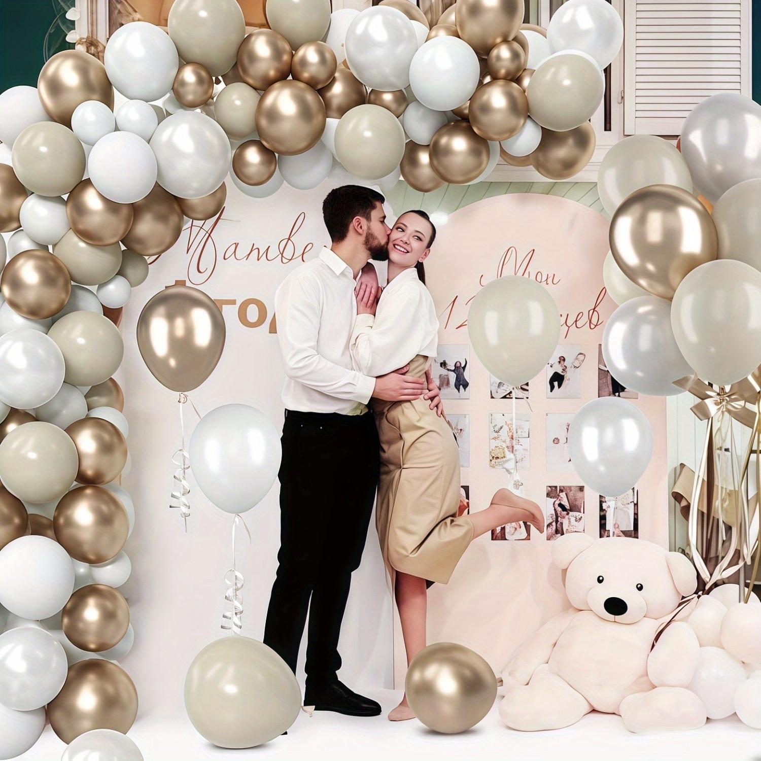 A set of 50 nude, champagne gold, pearl white, and apricot balloons, measuring 25.4 centimeters, is perfect for bohemian weddings, birthday celebrations, bridal gifts, and party decorations.