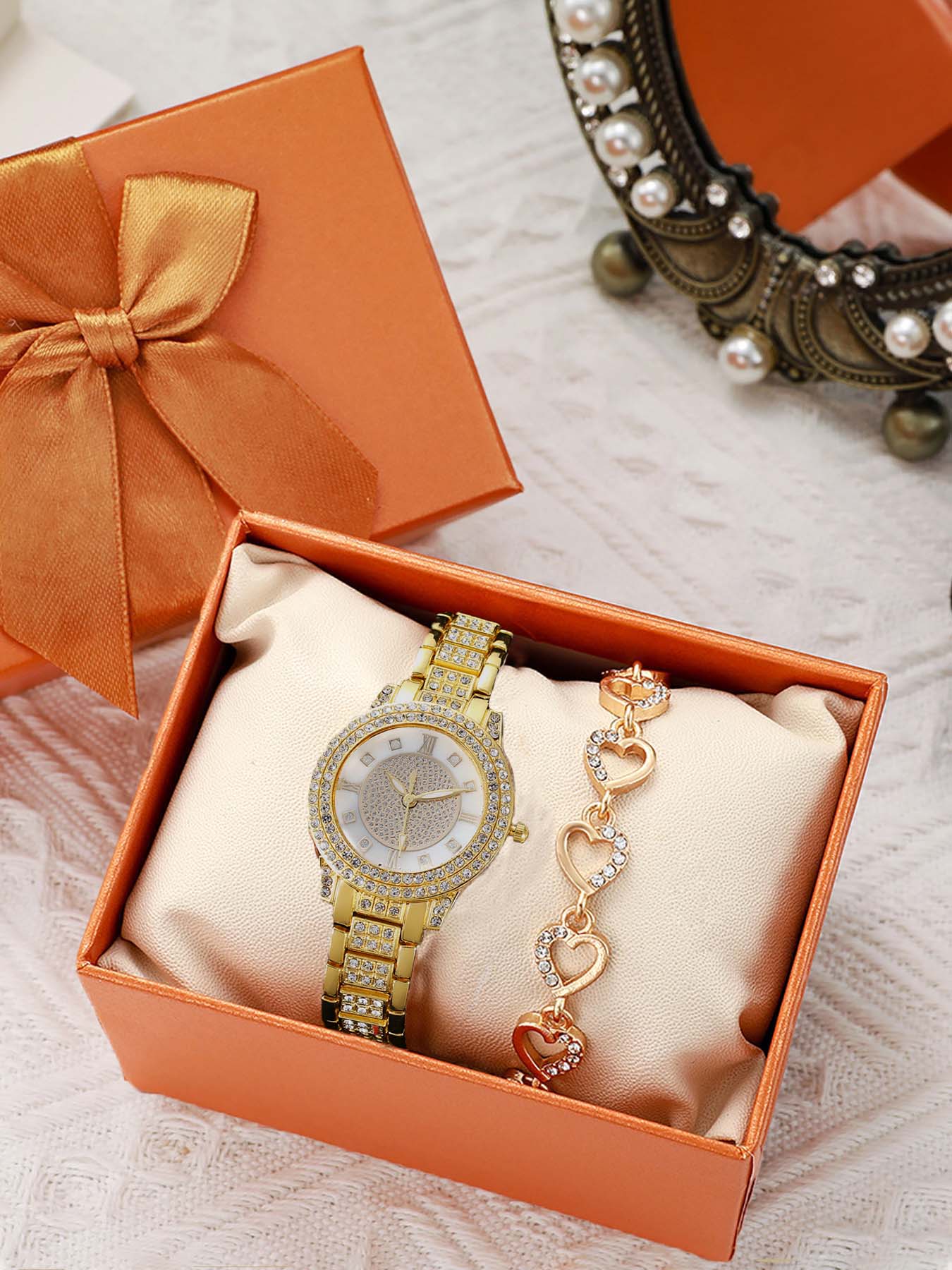 2-piece set of ladies' diamond-encrusted Roman numeral watch and bracelet