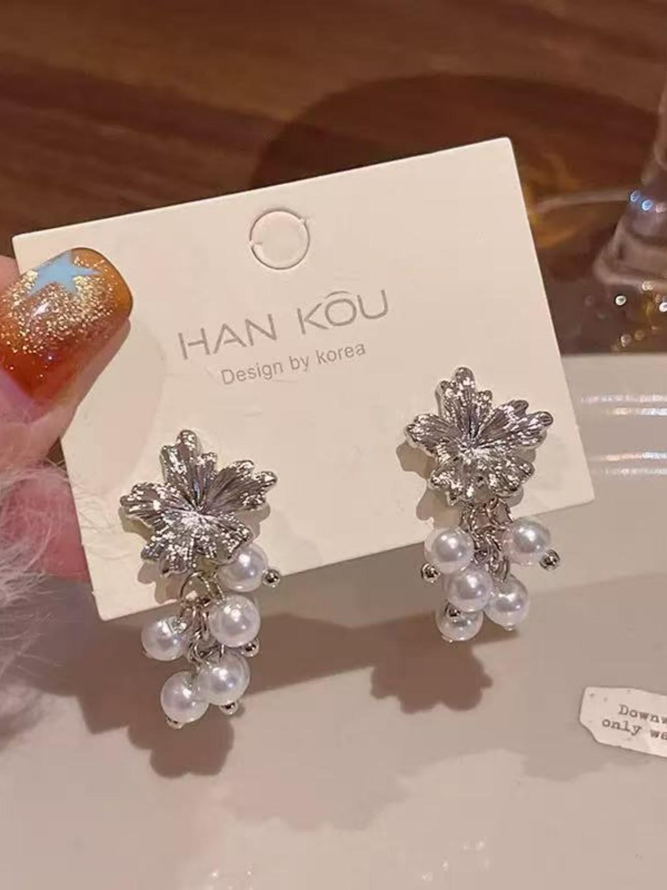 Exquisite metallic maple leaf shape with layered pearl tassels, creating a gentle and romantic vibe. The dangle design sways elegantly, adding a touch of sophistication to your daily look.