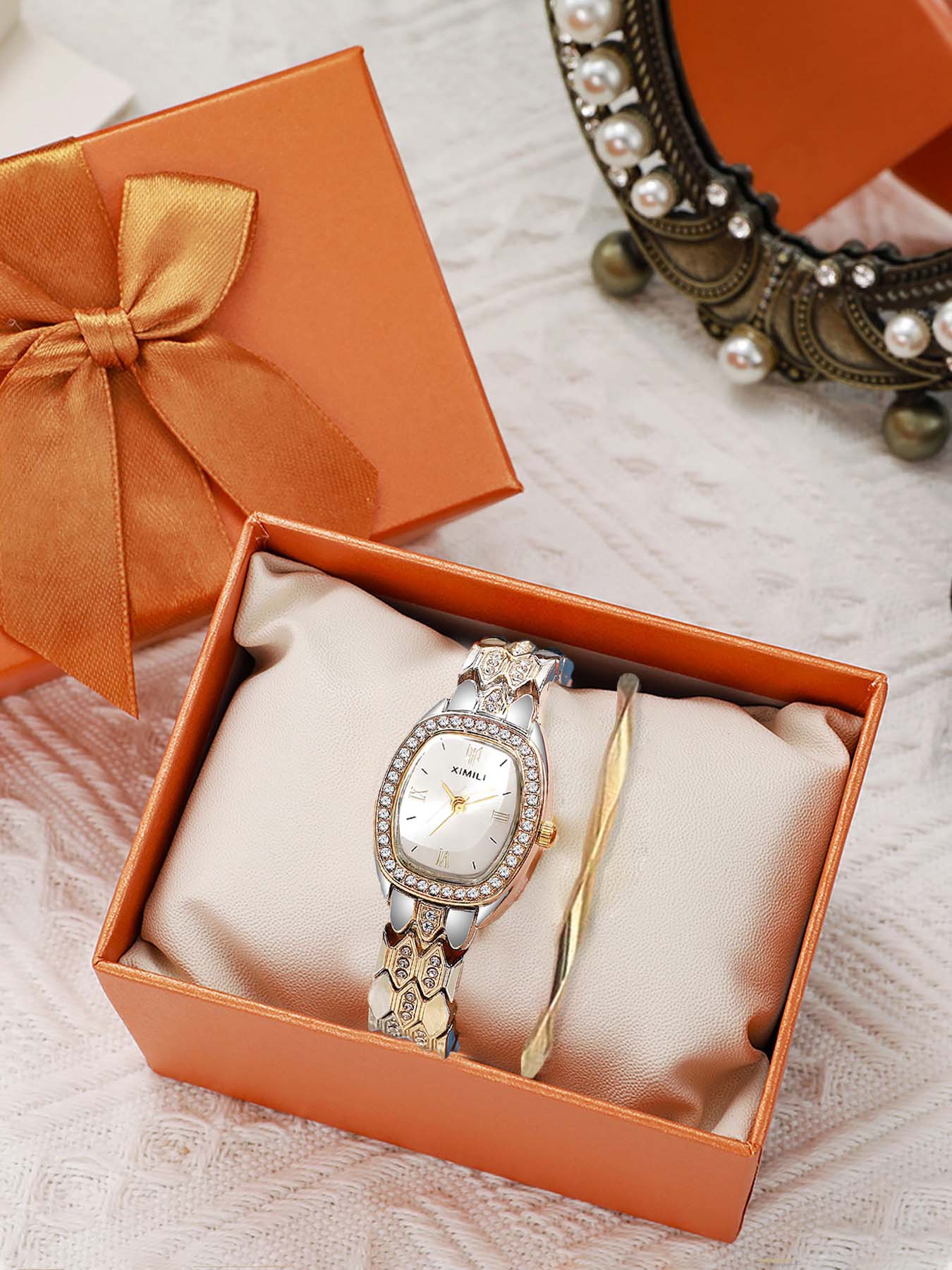 2-piece set of simple, casual, and fashionable oval alloy steel bracelet with diamond-embellished ladies' quartz watch set