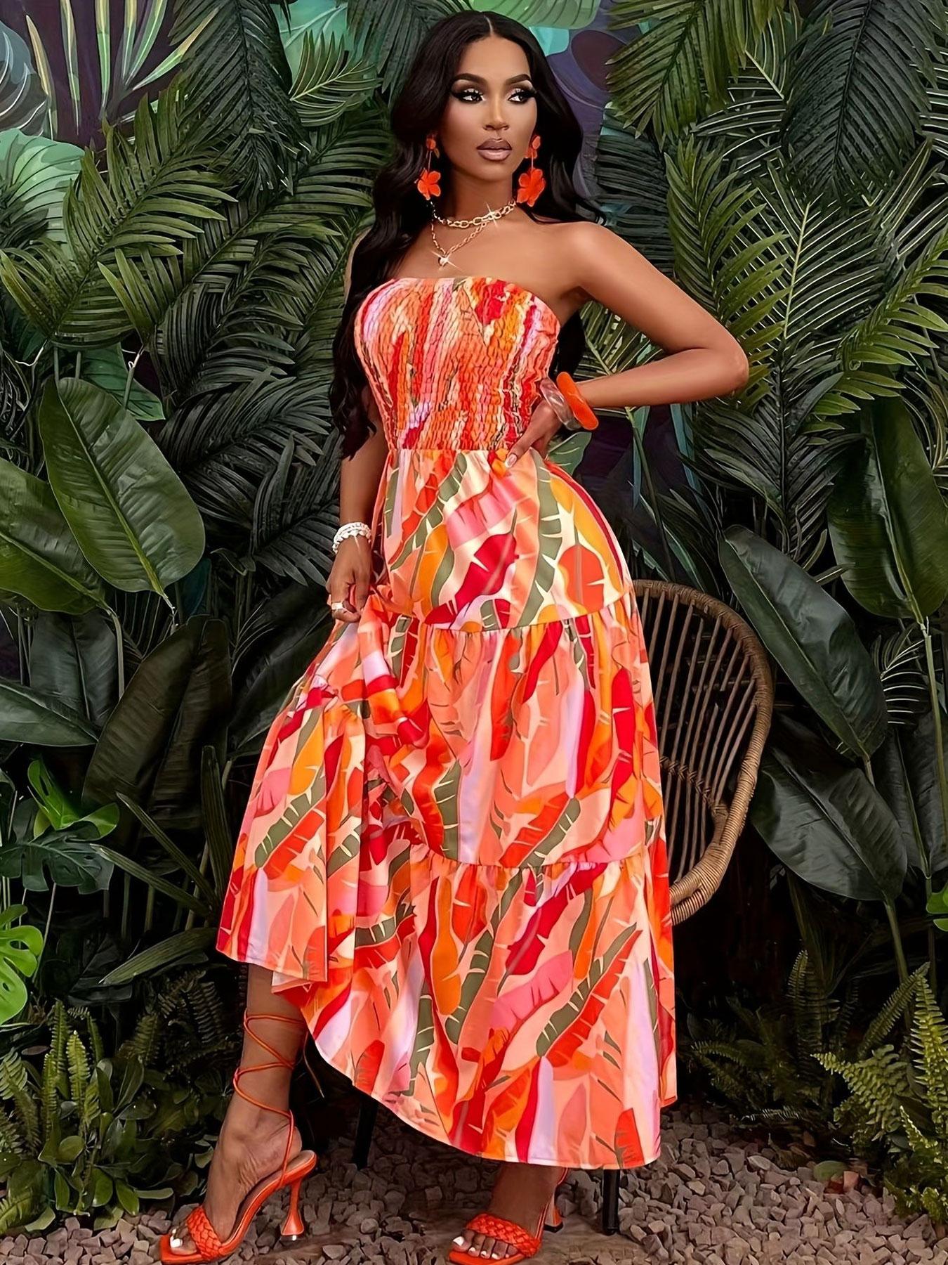 A women's orange-red color-block tropical floral print strapless tube long fashionable dress, suitable for summer, island vacations, tropical trips, and summer parties.