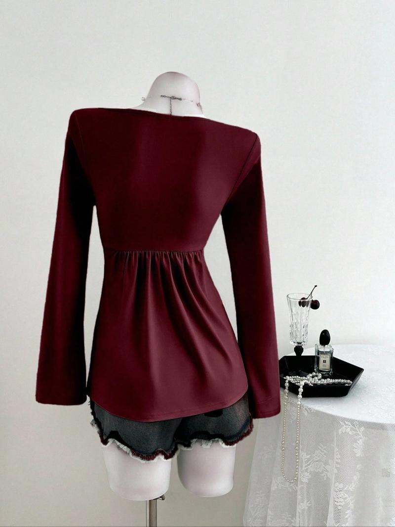 Women's casual V-neck long-sleeved T-shirt with knotted front, a versatile new style, suitable for casual and formal office commuting occasions.