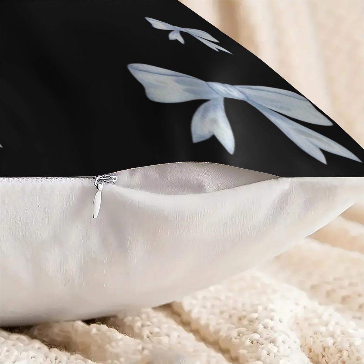 Soft short plush throw pillow with black background and blue bowknot print pattern, featuring a variety of patterns, soft and skin-friendly, a comfortable good for home or travel, embodying a lazy home style