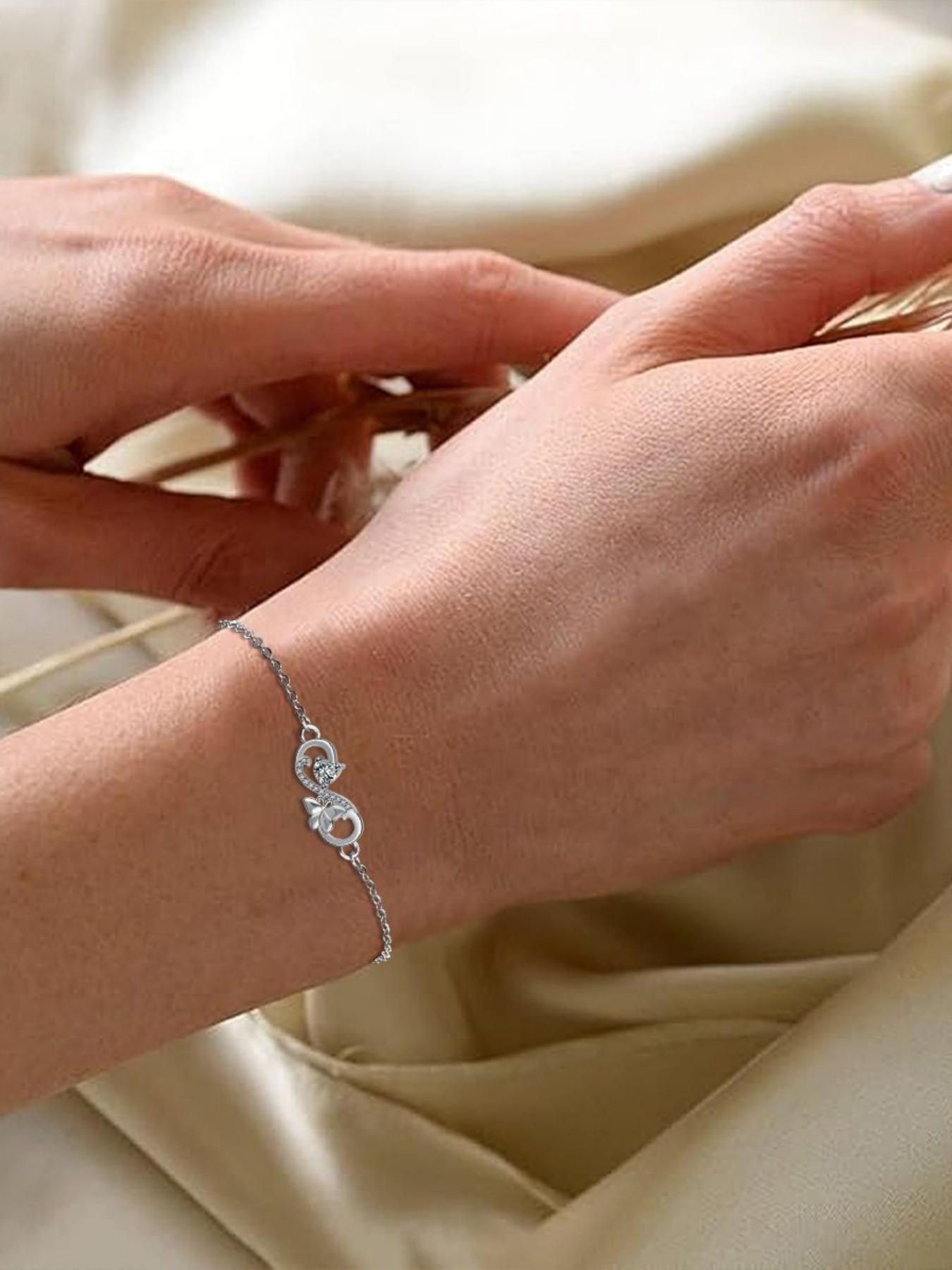 Butterfly Infinity · Diamond Glow Adjustable infinity symbol butterfly gem bracelet, delicate and sparkling.Paired with a surprise double-door preserved rose jewelry gift box.Ideal gift for birthdays, Mother’s Day and Valentine’s Day.