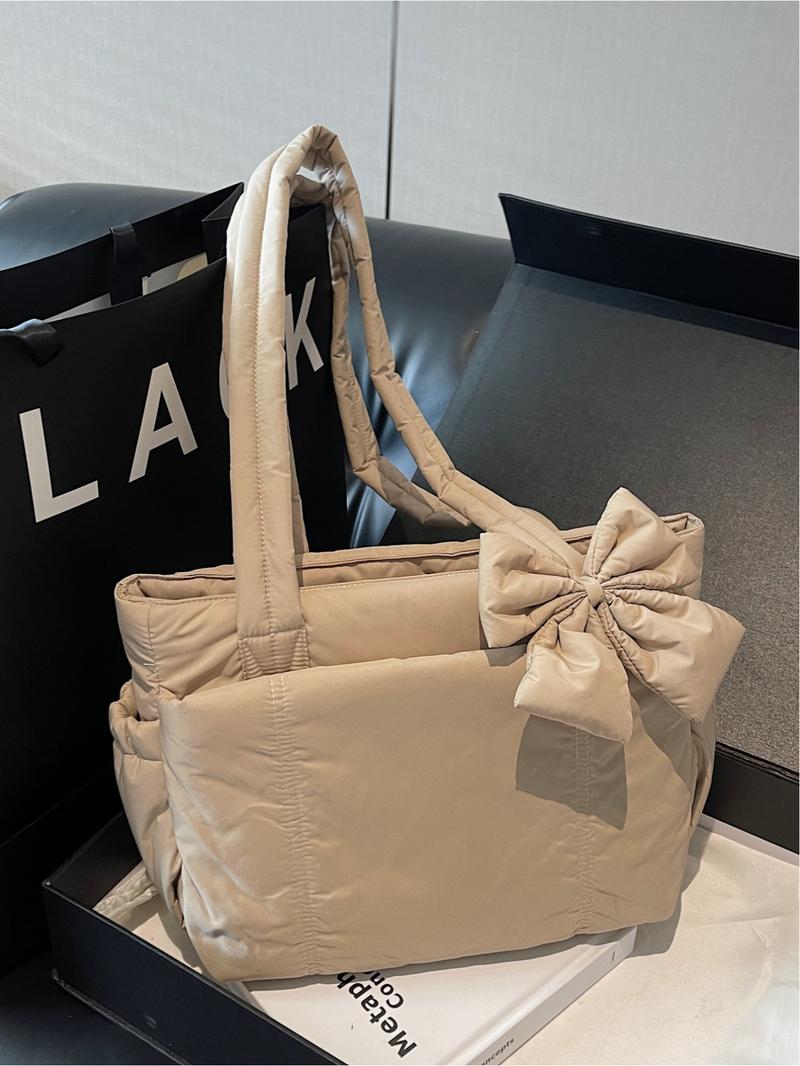 Pink quilted bow tote bag, a gentle, casual, lightweight, and spacious shoulder bag, Casual commuter bag, suitable for commuting, shopping, leisure outings, and everyday accessories.