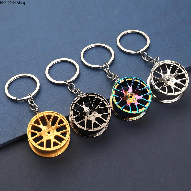 Realistic Silver Wheel Rim Keychain, Hollow Multi-Spoke Alloy Tire Charm, Cool Automotive Accessory for Car Guys, Heavy Metal Car Part Gift, Perfect for JDM Lovers, Car Keys, Backpack & Men's Everyday EDC Style.