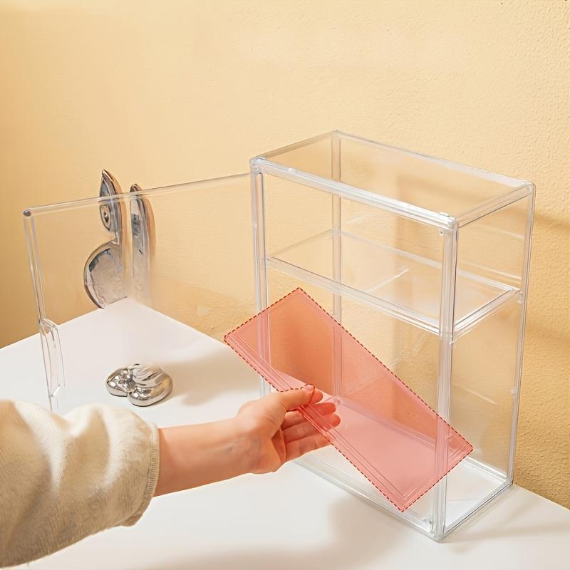 Multi-layer shelf transparent display cabinet provides ideal protection for collectibles and valuables in modern homes. It does not require electricity or batteries.