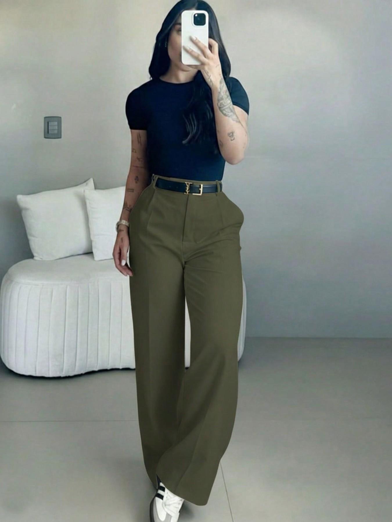 High-waisted trousers worn as a year-round wardrobe piece