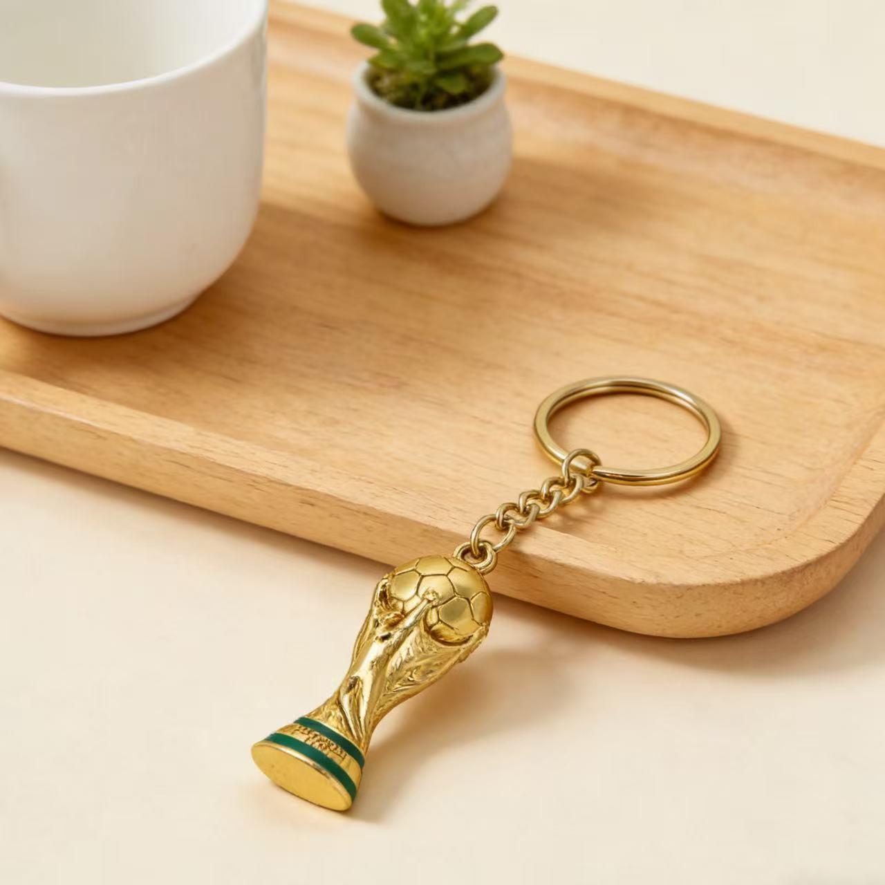 1pc 2026 World Cup Trophy Keychain, 3D Mini Replica Key Ring, Football Fan Souvenir Gift, Car Key Accessory, Backpack Charm for Soccer Lovers . Gold Plated Football Trophy Charm, Soccer Fan Gift, Car Key