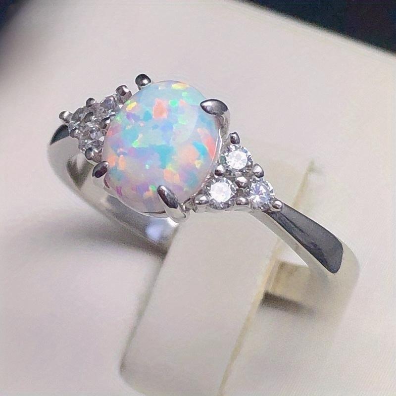 Classic and elegant oval inlaid imitation Australian treasure women's ring suitable for daily parties, banquets, engagements, women's jewelry gifts