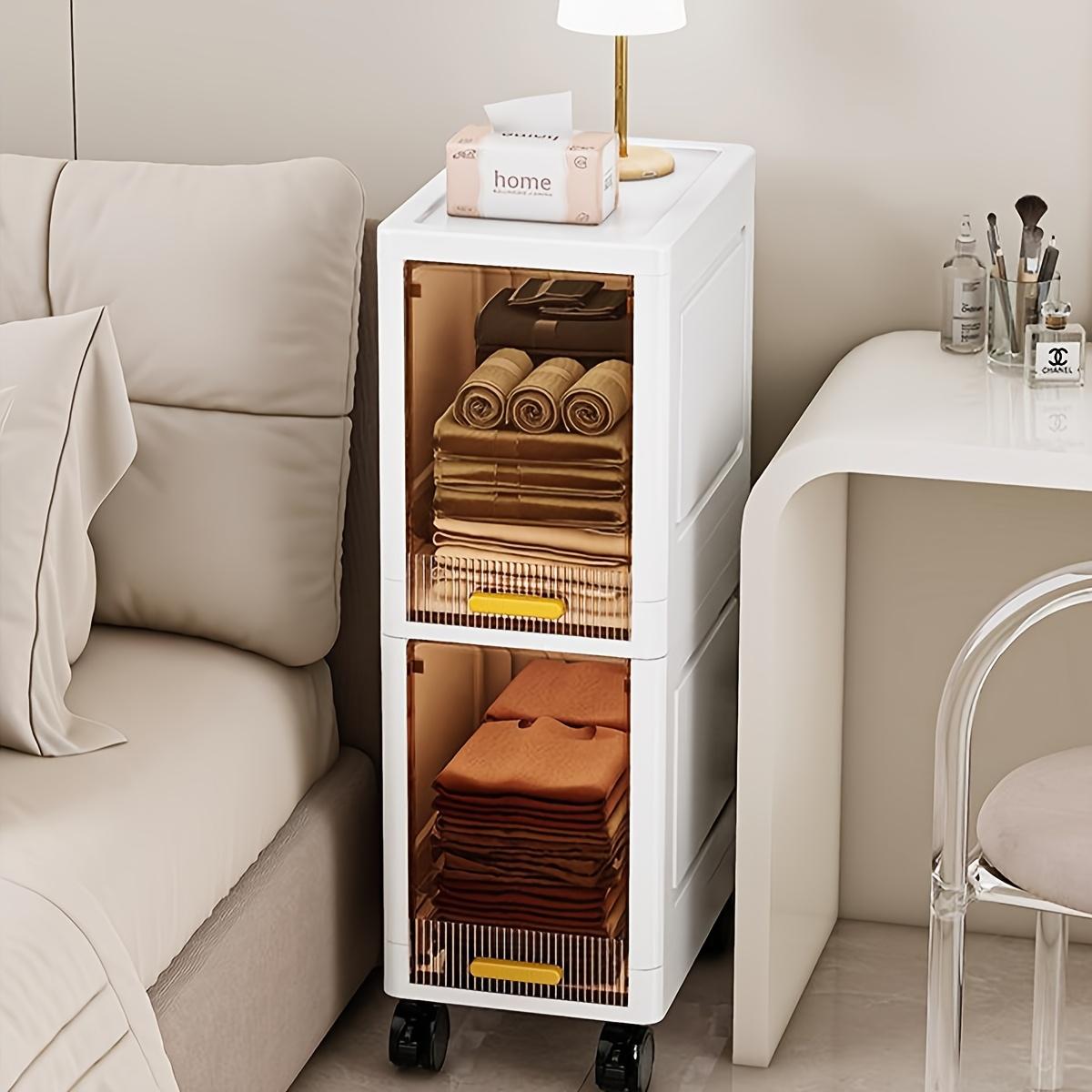 This is a multi-functional storage cabinet, available in 3, 4, or 5 tiers. It is designed to be dust-proof and foldable. Equipped with pull-out shelves and covered storage boxes, it is ideal for organizing snacks, clothes, and books.