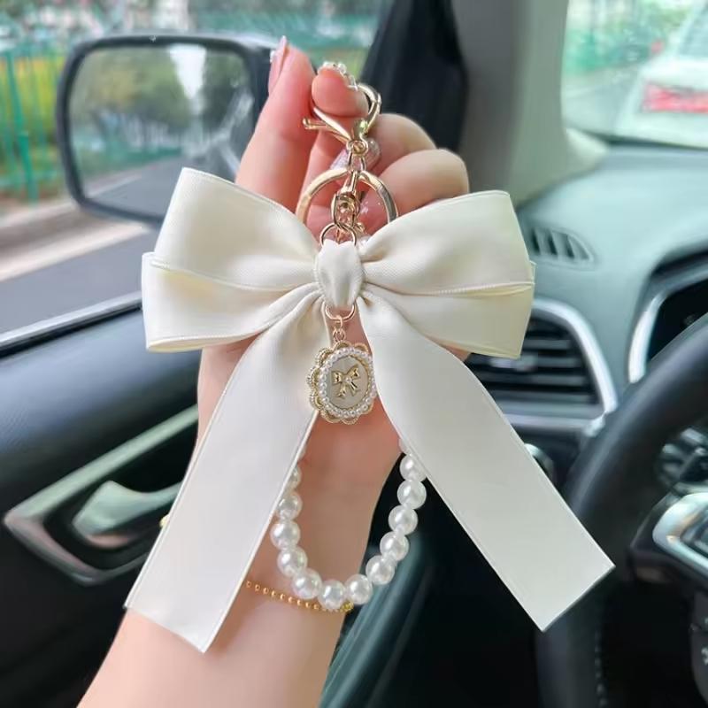 Creative Bow, Pearl Chain Keychain, Women's Fashion Bag Pendant, Car Keychain, Phone case chain, Personalized Ribbon Necktie, Fashionable Alloy Keychain