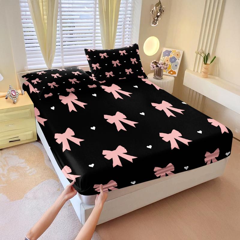 3-piece Bedding Set Features A Black Background With Pink Bow And Heart Prints, Including A Fitted Sheet And Two Unfilled Pillowcases. The Design Blends Two Elements, Creating A Romantic And Sweet Yet Cool Bedroom Décor, Gift Choice, Bed Sheet Sets
