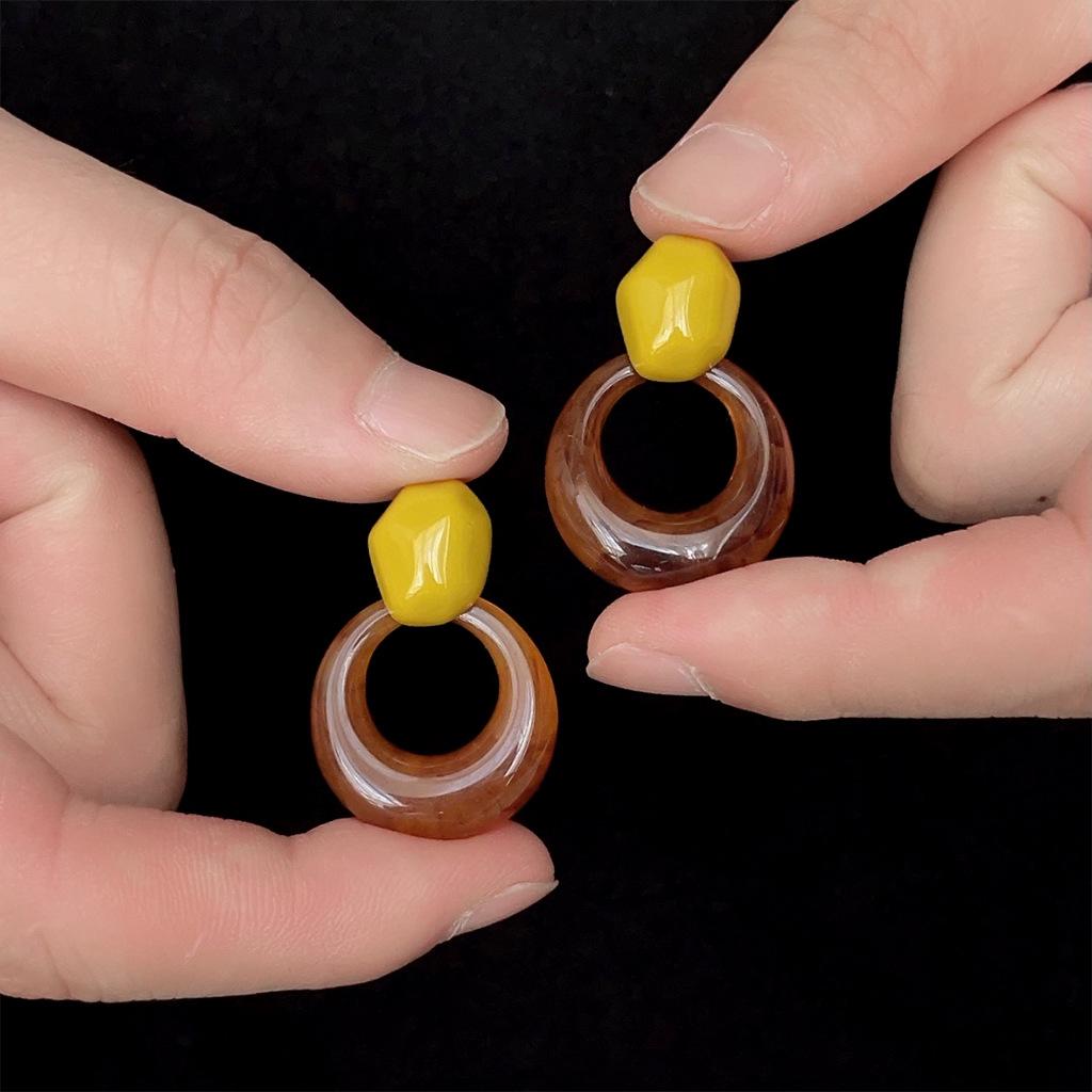 A Pair of Circular Maillard Retro Earrings Bold, Vintage-Inspired, and Niche-Style Accessories