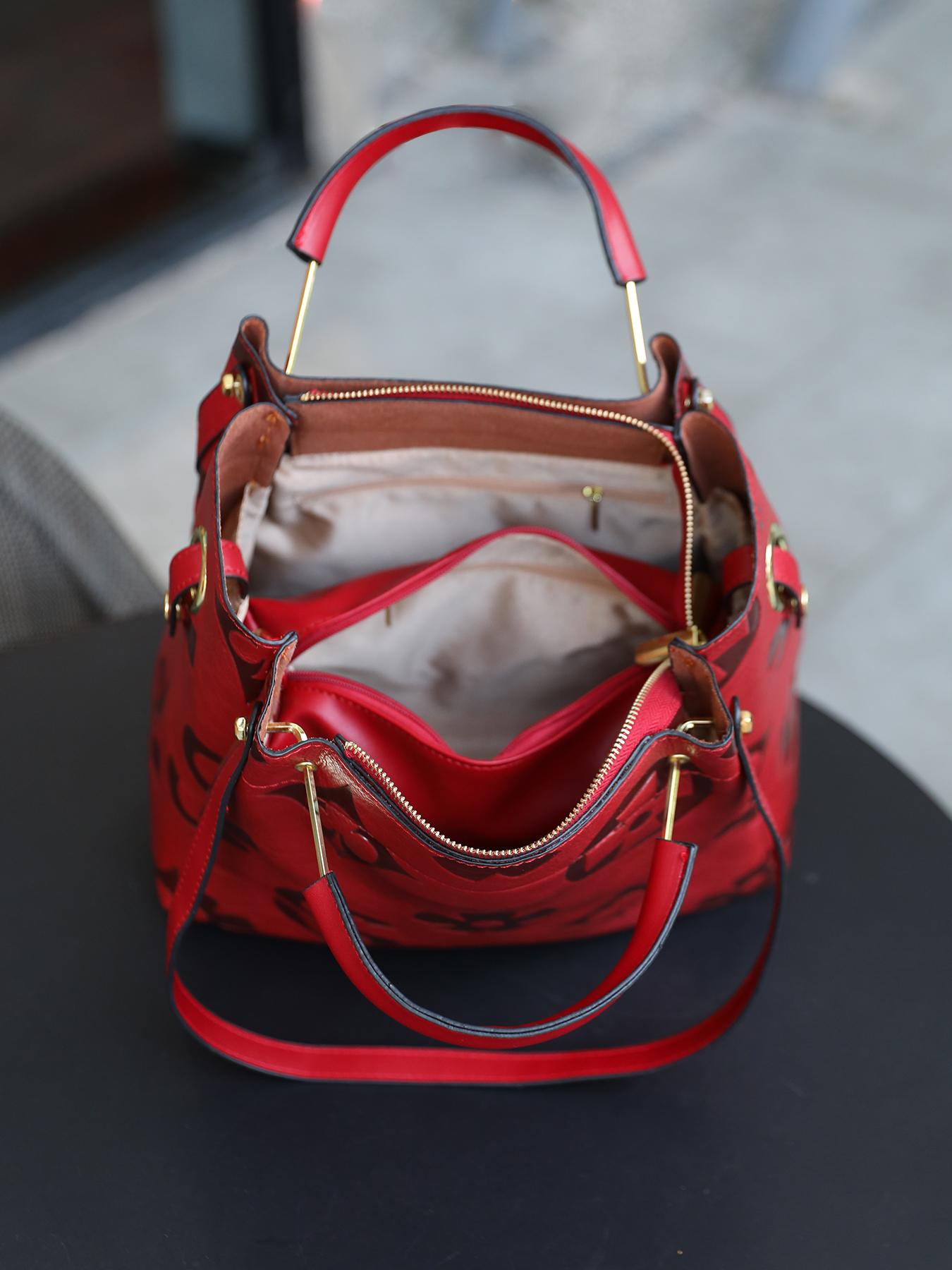 An elegant floral embossed faux leather handbag - suitable for women's use - fade resistant zipper tote bag - equipped with fixed shoulder straps - polyester lining - edge painted - suitable for work and various occasions