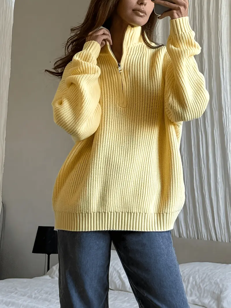 Women's cream sweater outfit
