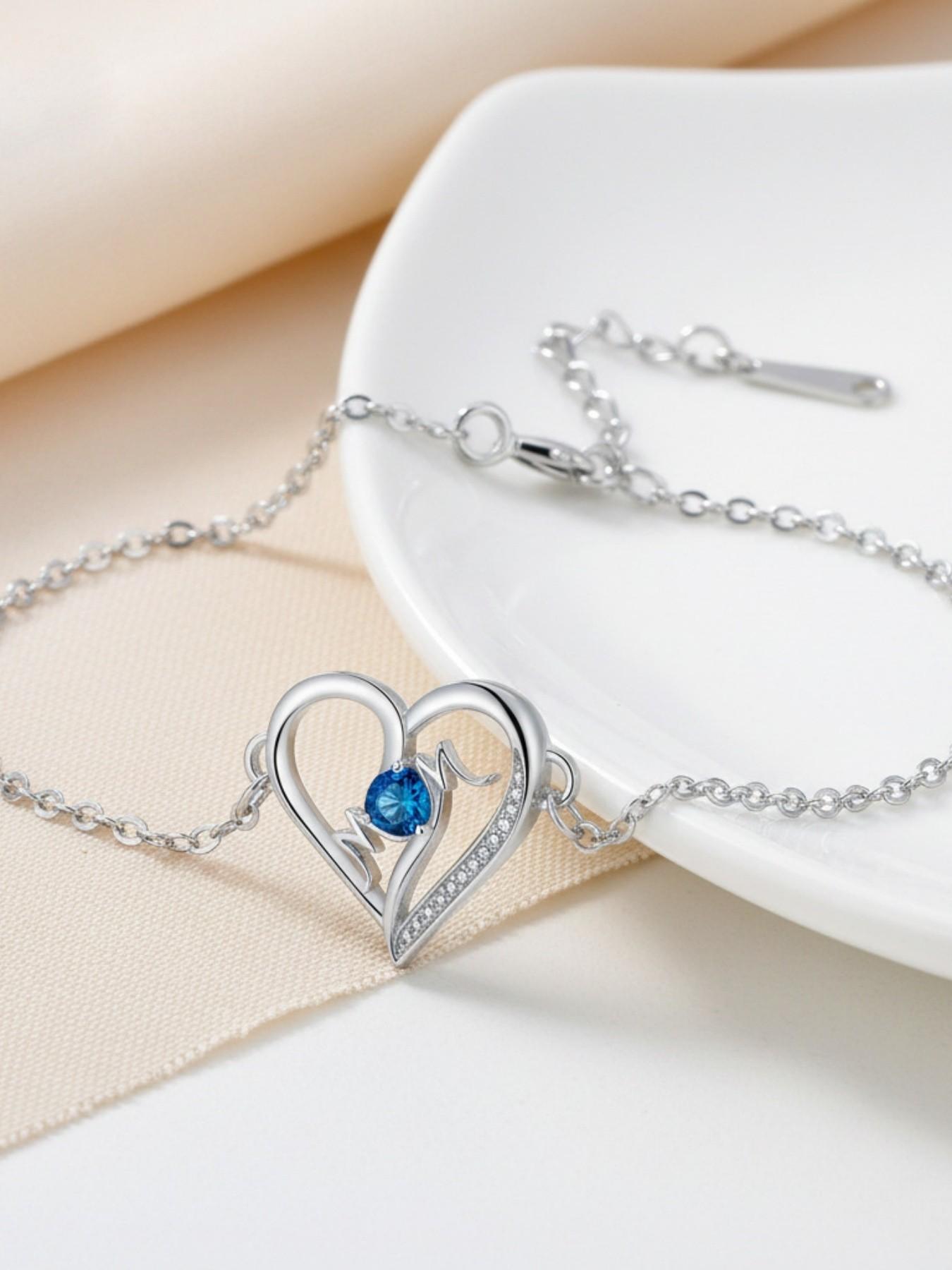 MOM Heartbeat · Blue Glow Simple luxury high-end heart-shaped MOM bracelet, elegant and warm.Paired with a surprise double-door preserved rose jewelry gift box.Ideal gift for birthdays, Mother’s Day and Valentine’s Day.
