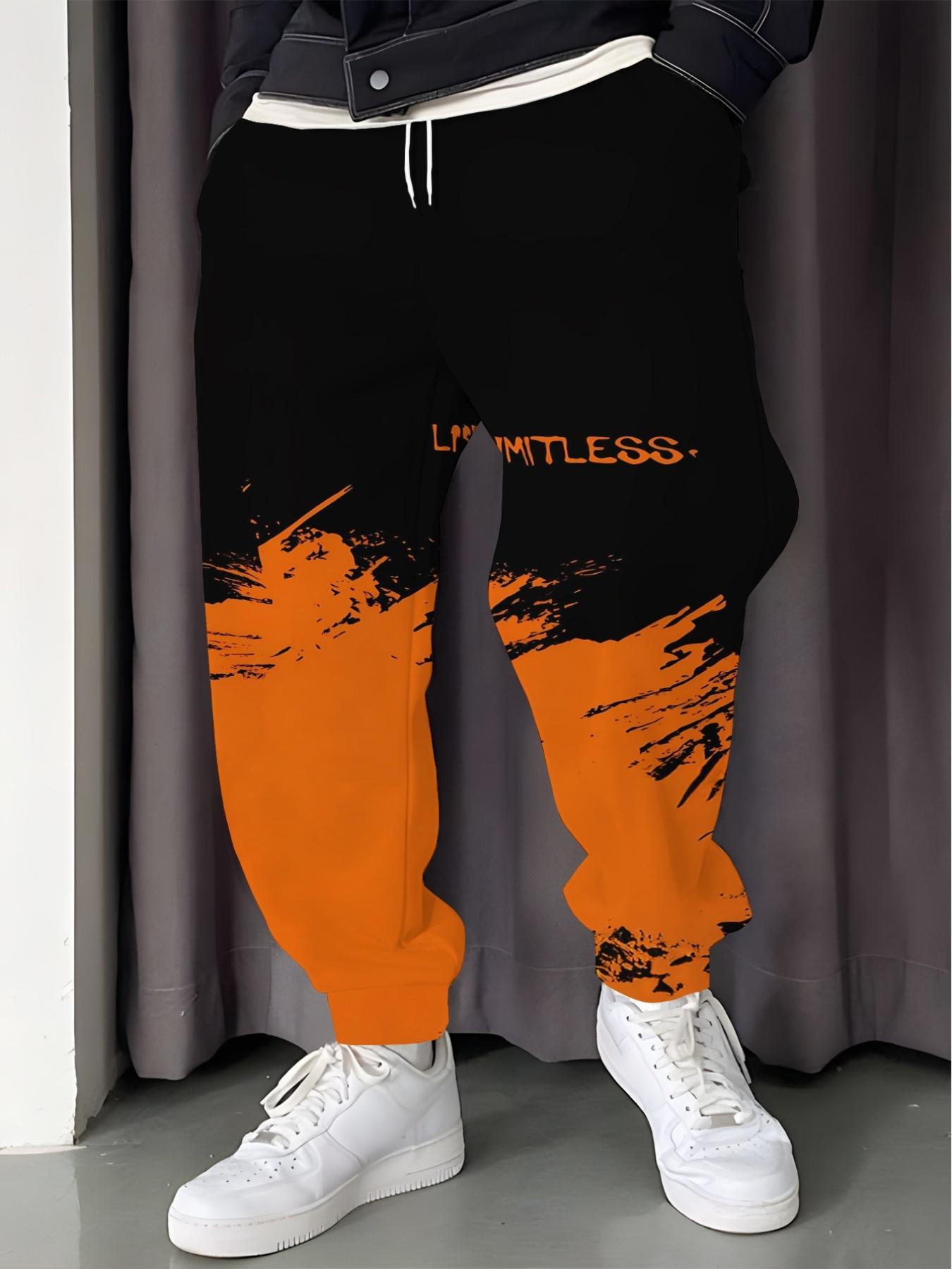 Stylish Men's Printed Track Pants with Gradient Orange Print, Drawstring and Pockets. Comfortable and Casual, Made of Stretch Polyester.