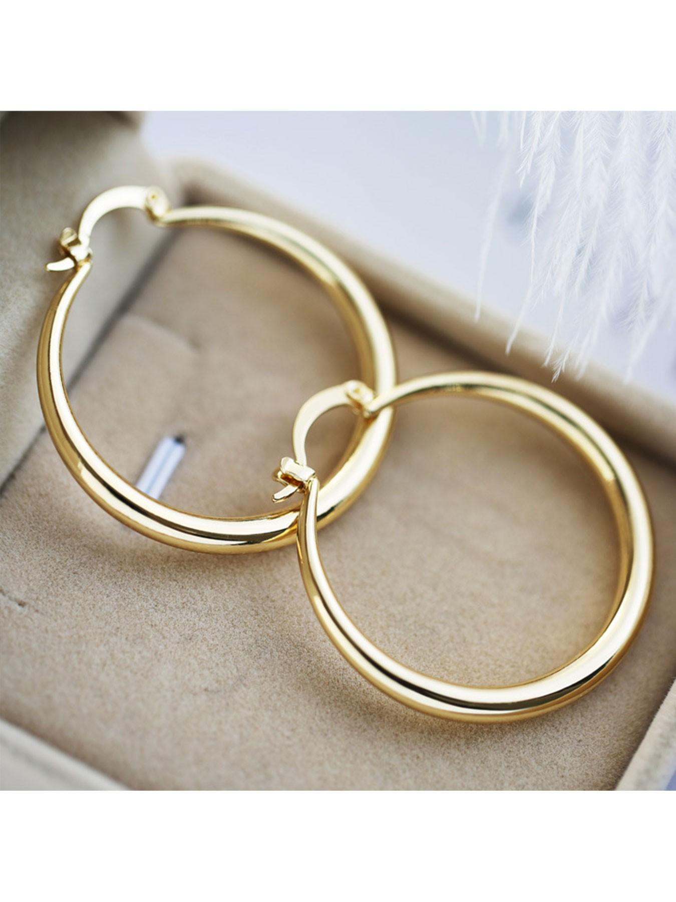 1 pair of gold/silver plated oversized hoop earrings with a minimalist, glossy punk style, perfect for holiday parties and streetwear looks.