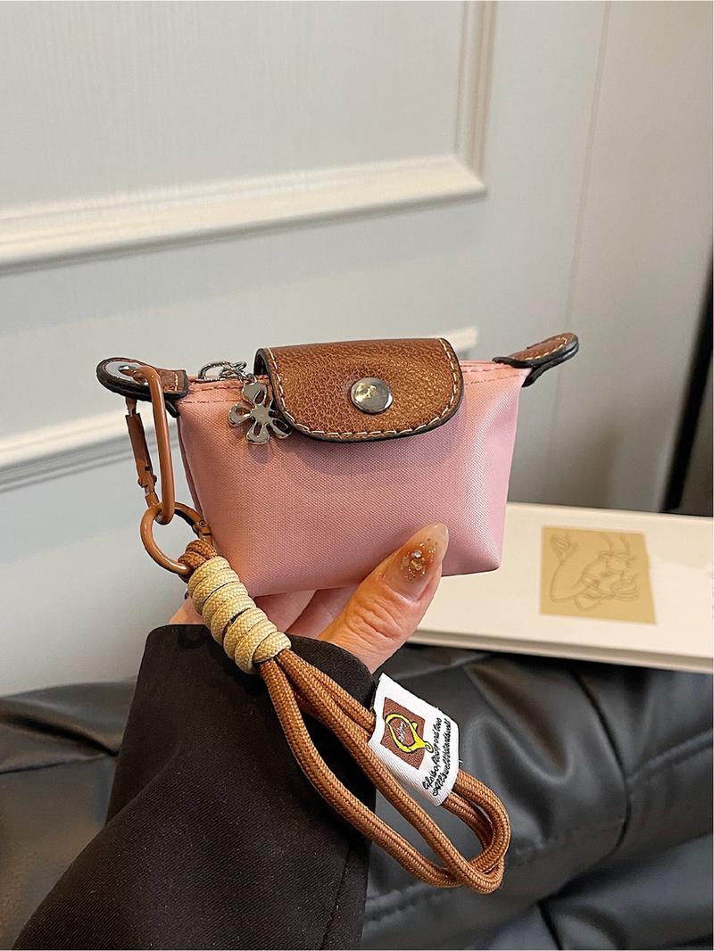 Mini women's flip button casual and compact handbag, wrist pocket, multiple colors to choose from, suitable for daily clothing matching, fashionable for going out.