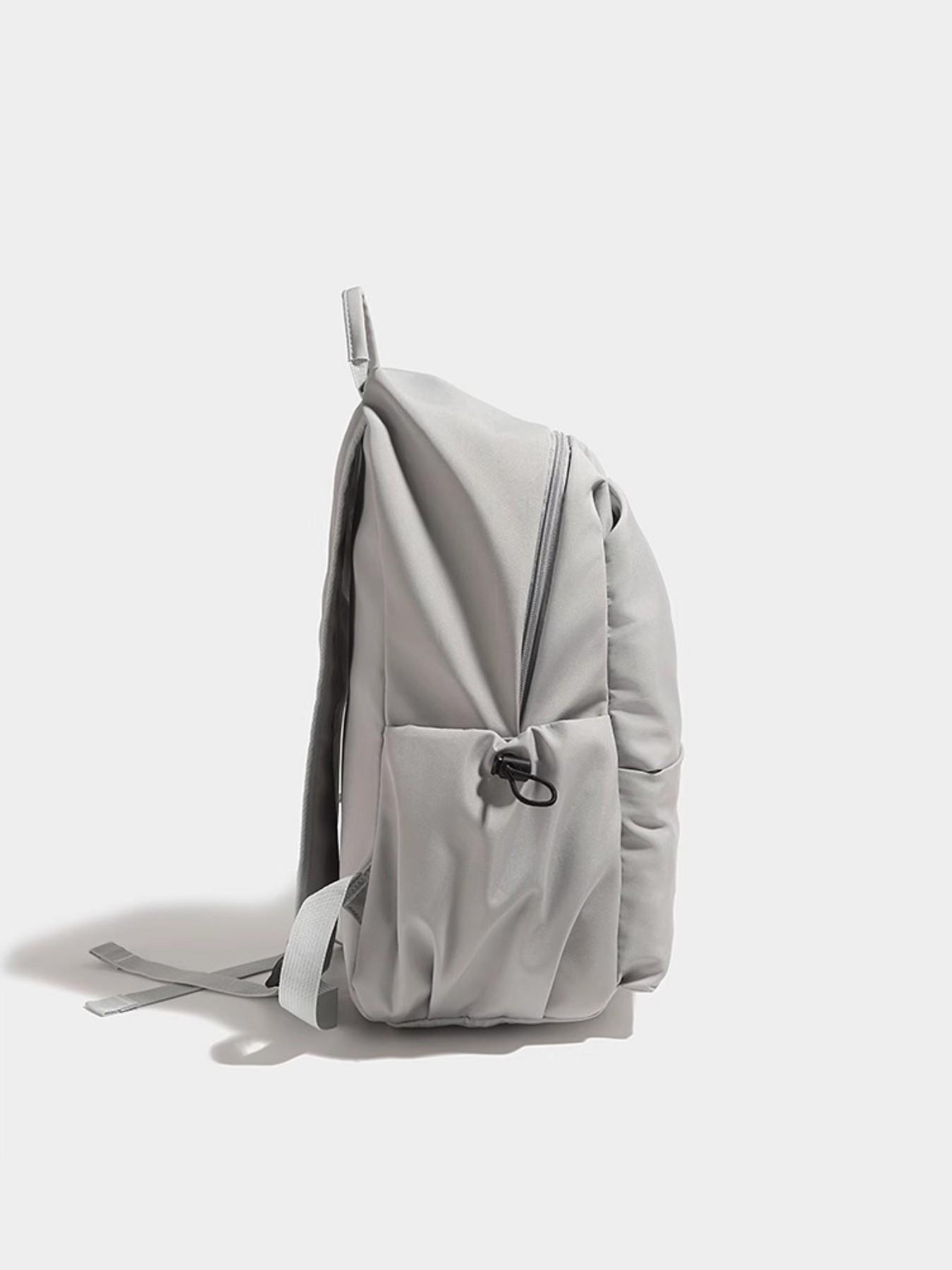This sleek and minimalist backpack is perfect for short trips, leisurely strolls, and everyday commuting. It's a versatile computer bag that's lightweight and sturdy, making it ideal for a variety of occasions.