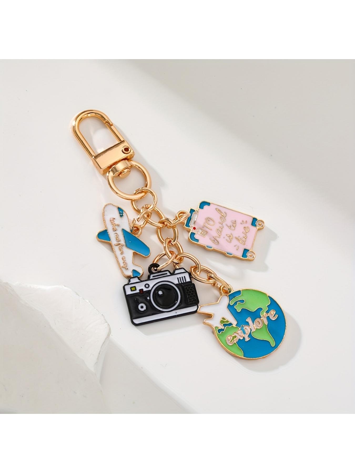 1pc Travel-themed keychains - Containing aircraft, camera, Earth and luggage accessories, stylish enameled metal keychains are perfect for decorating and the perfect gift for travelers