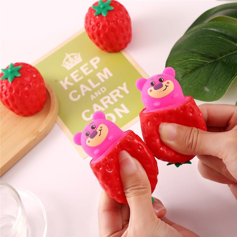 Realistic Strawberry Squeeze Toy — give it a squeeze and a cute little bear pops out 🍓🐻! An ultra-bouncy, squeezable sensory stress-relief toy, perfect for parent-child interaction and a great icebreaker for social gatherings.
