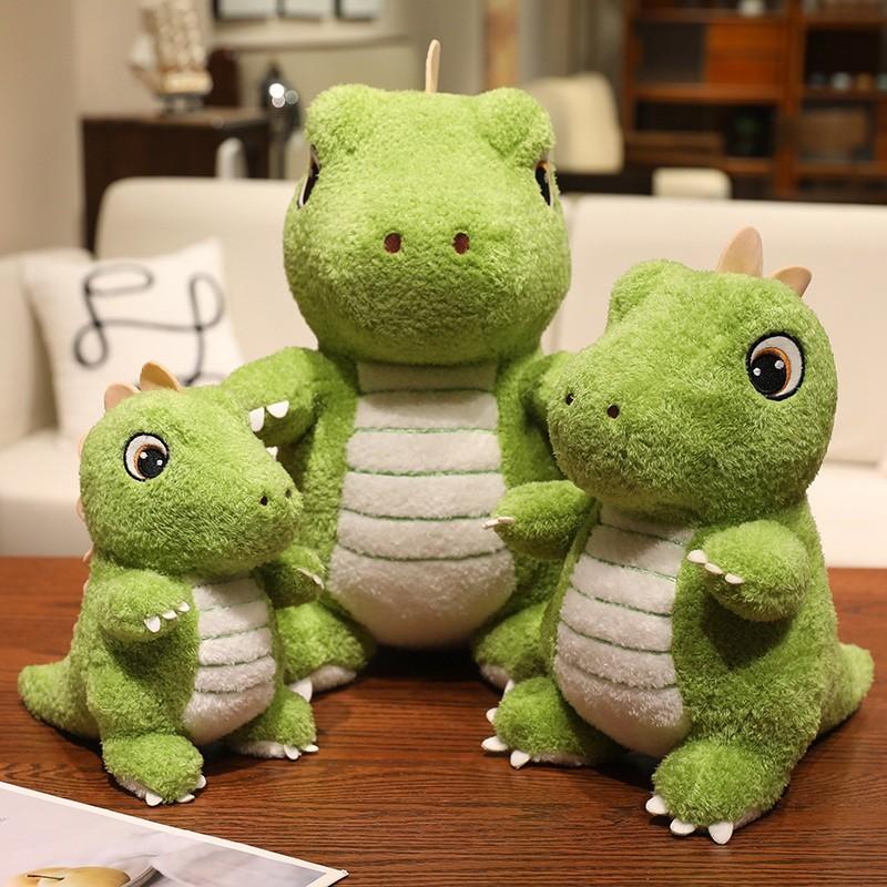 Cute green dinosaur plush toy with adorable, big eyes and endearing expressions, perfect for kids. Soft and comfortable, it can be used as a sofa cushion. A fun gift for children’s festivals, birthdays, or Christmas.