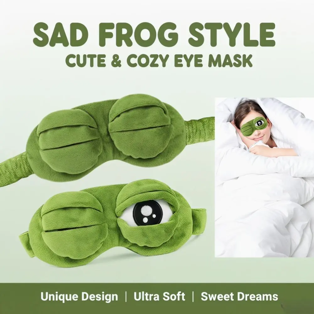 Frog Sleep Mask — A stylish, shimmering sleep mask featuring an adorable "Sad Frog" design. This fun, plush eye mask is perfect for travel, yoga, napping, and light-blocking; its soft cotton lining gently cares for sensitive skin.