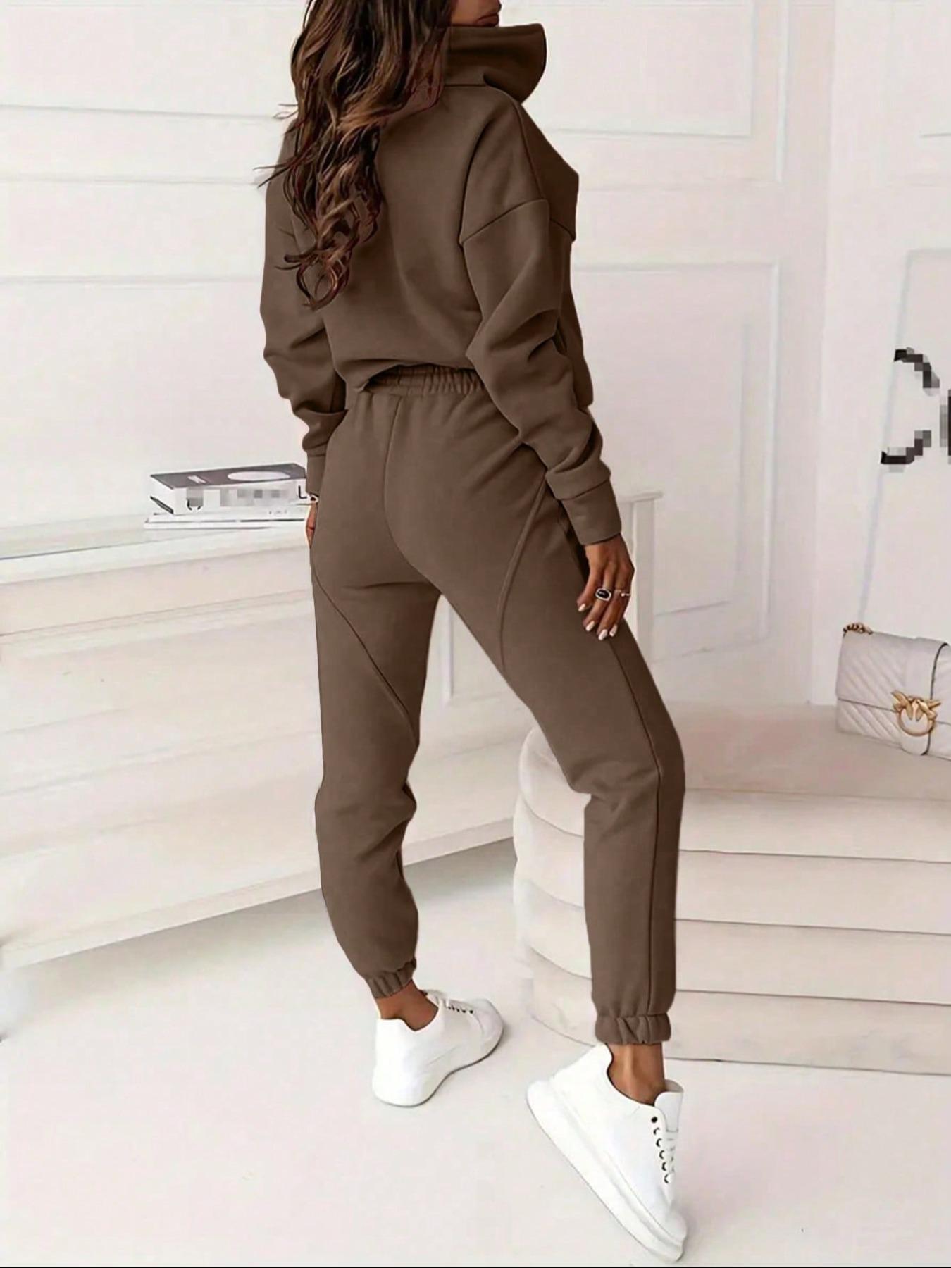 Two-piece women's solid-color crew-neck pullover with long sleeves and elastic waist and loose-fitting bottom pants, perfect for all occasions and versatile in style.
