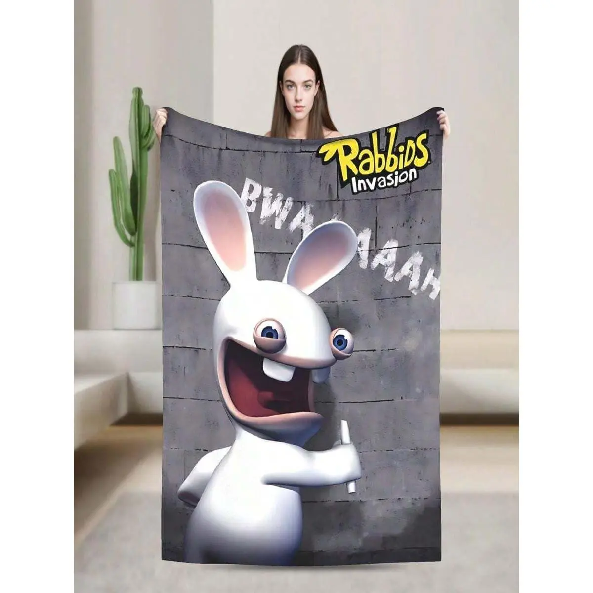 This flannel blanket with a cartoon Rabbids pattern is soft and comfortable, making it an ideal choice for sofas, beds, offices, and travel. It's suitable for all seasons and makes a perfect gift for friends and family.