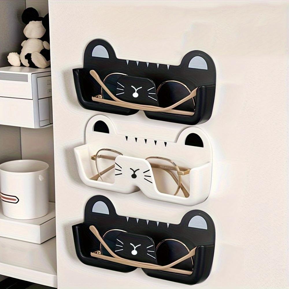 Wall-mounted punch-free glasses organizer, stylish and multi-functional storage, can be installed in various spaces, easily stores glasses and efficiently saves space.