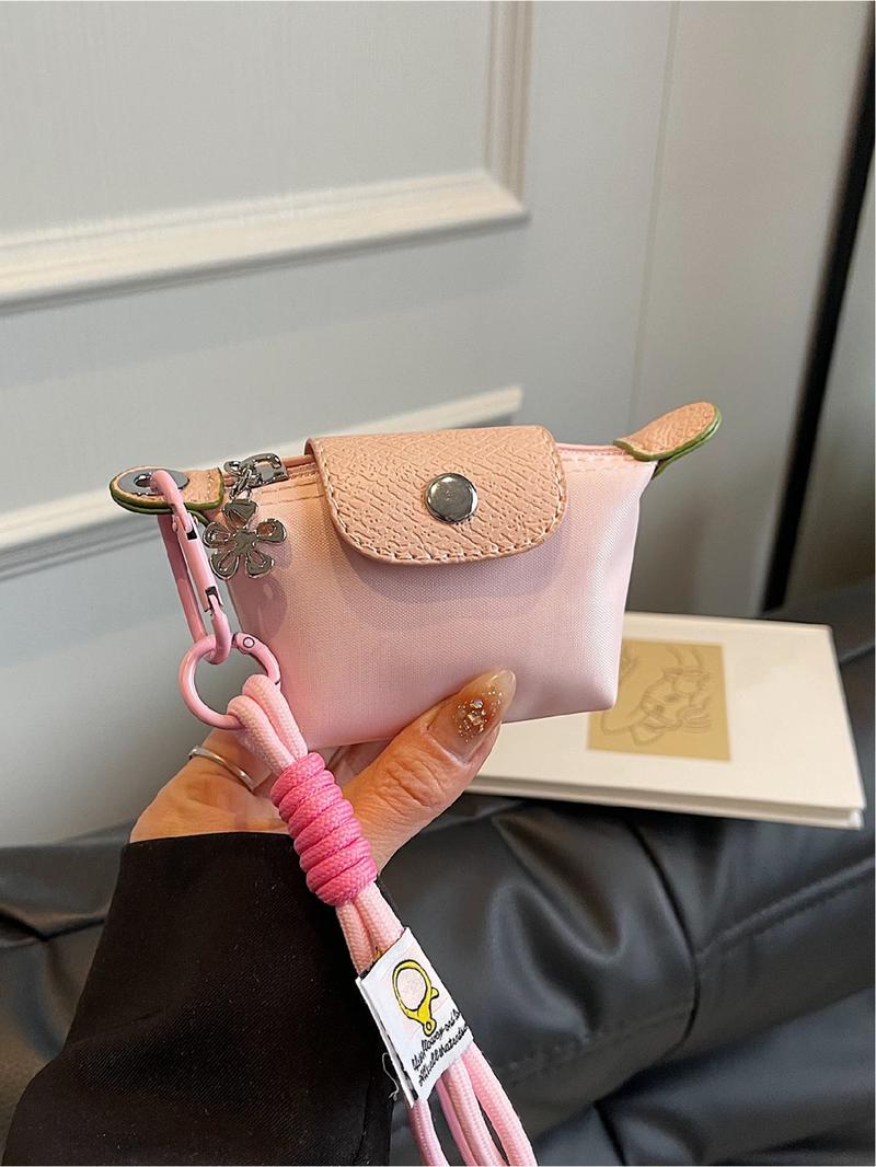 Mini women's flip button casual and compact handbag, wrist pocket, multiple colors to choose from, suitable for daily clothing matching, fashionable for going out.