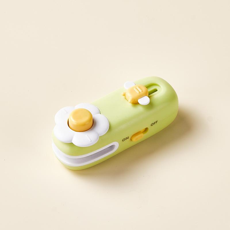 Mini sealing machine Small household sealing machine Hand pressure sealing machine Snack bag Magnetic attraction