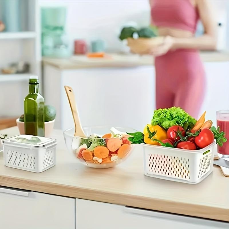 Stackable refrigerator storage container with removable drain basket. Suitable for kitchen storage containers made with BPA-free polypropylene Kitchen Drain Fresh Fruits and Vegetables Grocery Seal Moisture Resistant