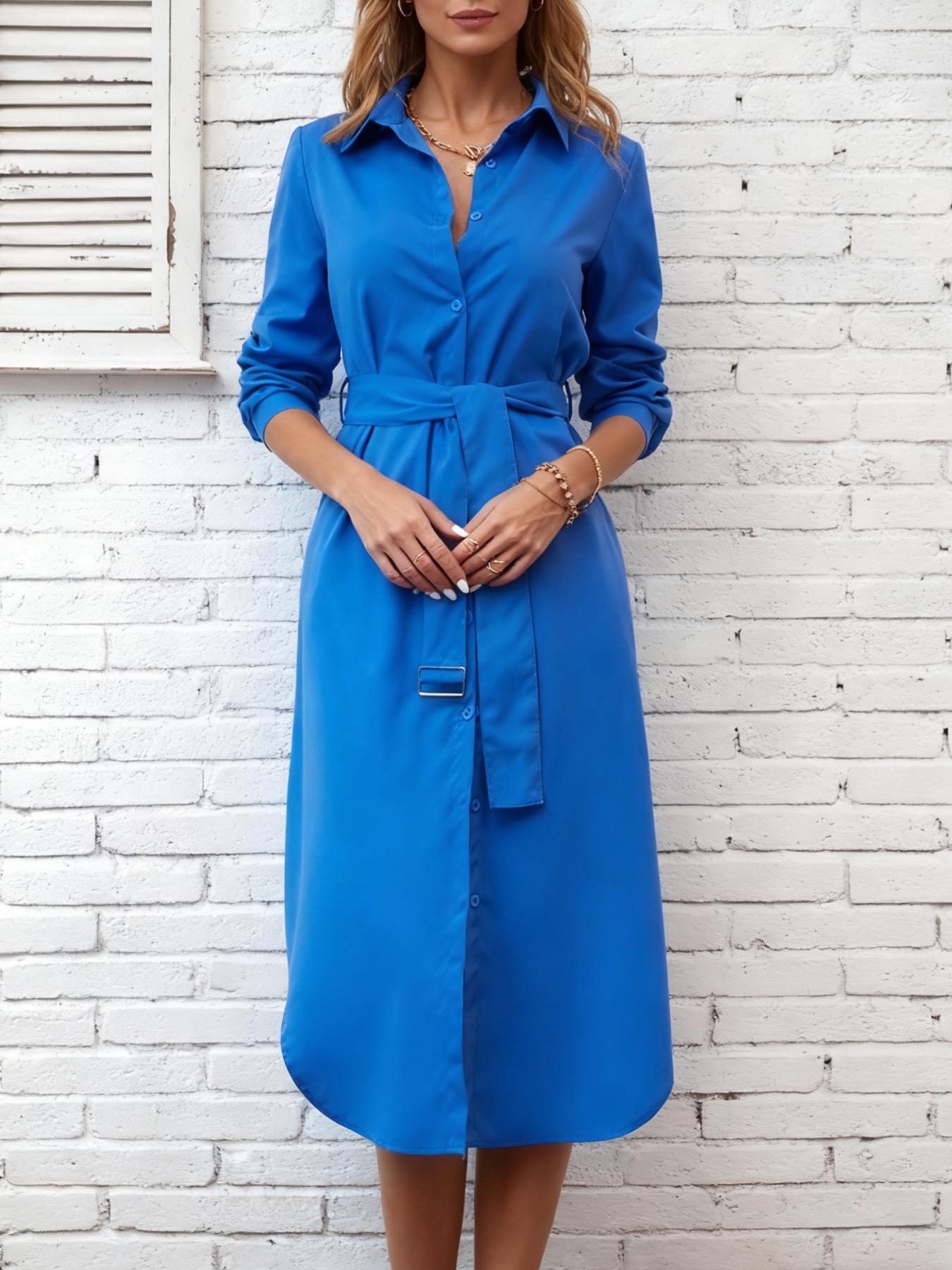 A women's lapel Collared single-row button-up skirt hem split design waist shirt dress, suitable for autumn and winter, suitable for retro commuter style, dating style and other styles.