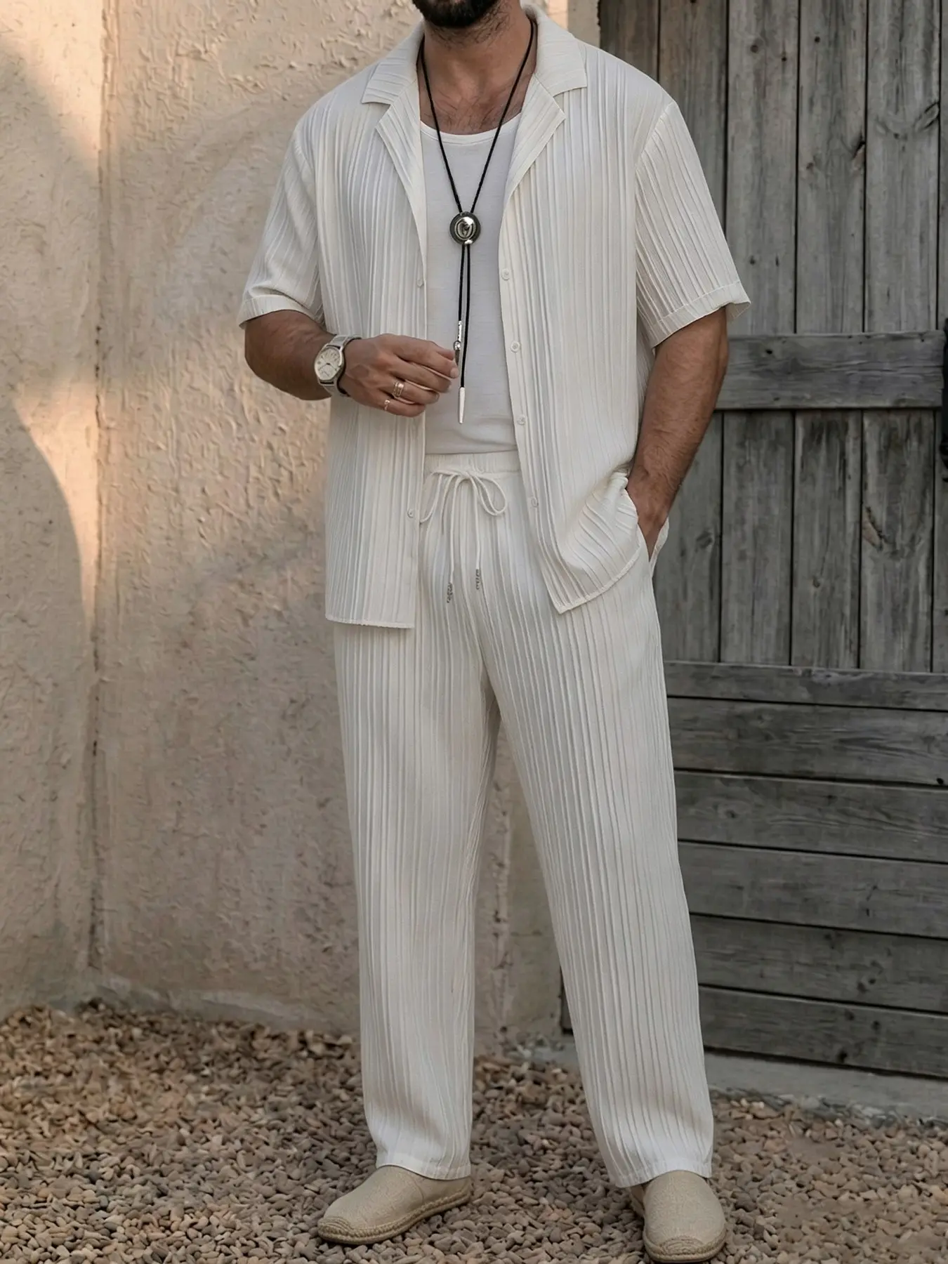 Men's Vertical Pleated Cuban Collar Short Sleeve Shirt & Elastic Waist Straight Long Pants 2 Piece Outfit, Minimalist Solid Loungewear Matching Set, Breathable Lightweight Crinkle Fabric Loose Fit Tracksuit For Men Daily Rest Travel Casual Wear