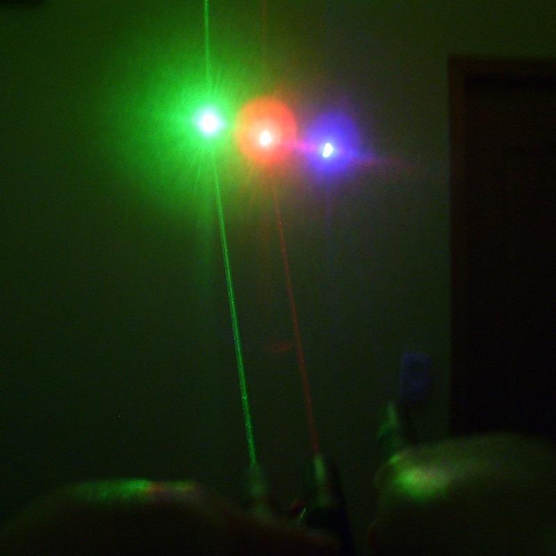 Professional Laser Pointer, 4-in-1 Red Green Blue Purple Beam, 500m Range with Remote Control. Perfect for Presentations, Teaching, Training, and Pet Toys. Portable, Anti-Slip, Safe Design. Great for Cats and Dogs.