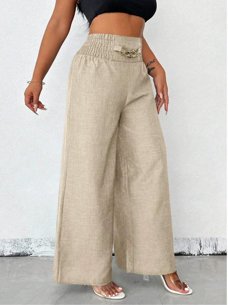 A pair of women's solid-color zipper-enclosed high-waisted stretchable loose-fitting slimming wide-leg trousers that are versatile and suitable for all occasions.