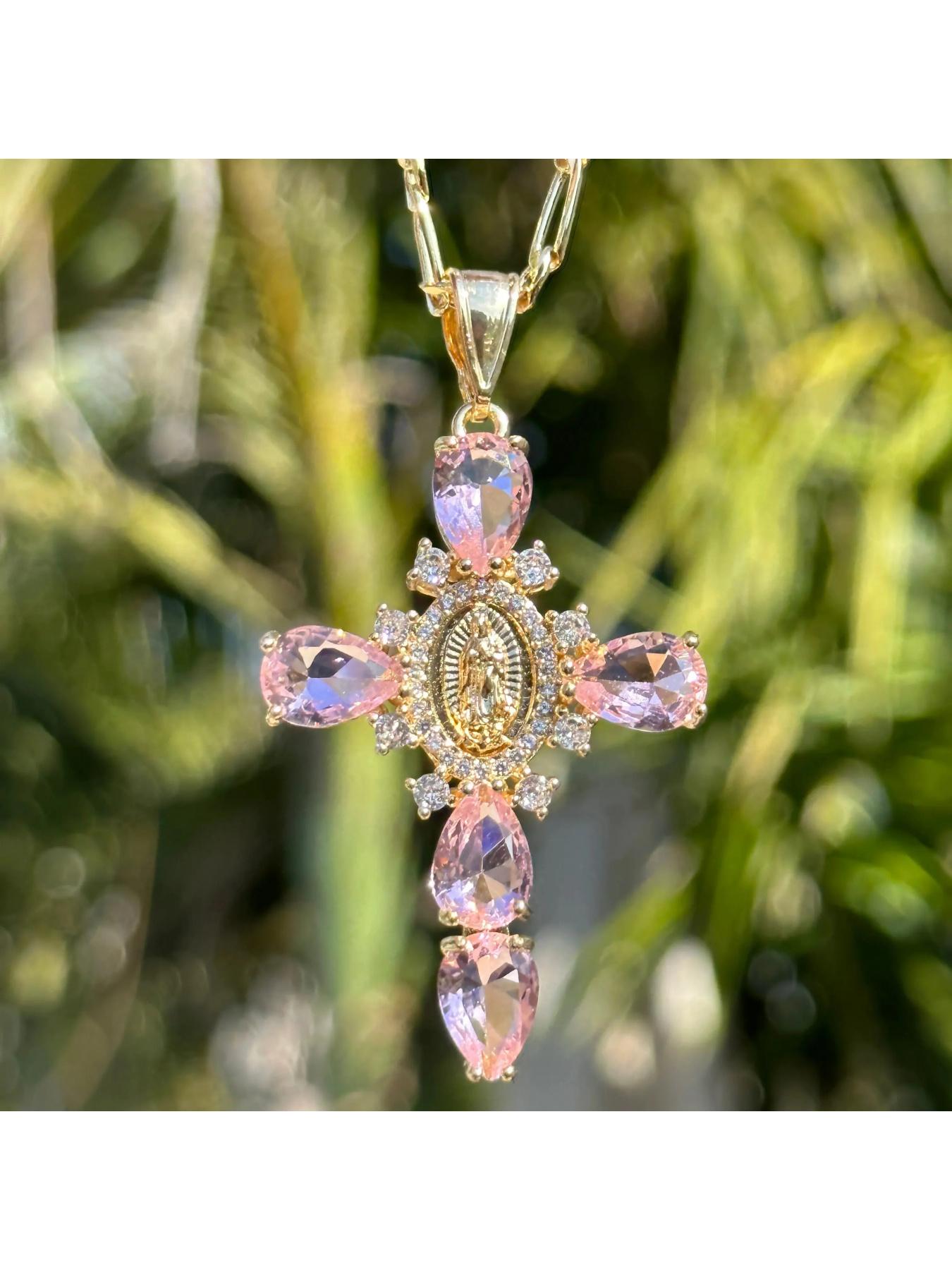 Our Lady of Guadalupe Cross Pendant NecklaceTeardrop Crystal Religious Jewelry. A golden cross adorned with a delicate image of the Virgin Mary, surrounded by sparkling teardrop-shaped crystals, available in purple/pink/transparent colors
