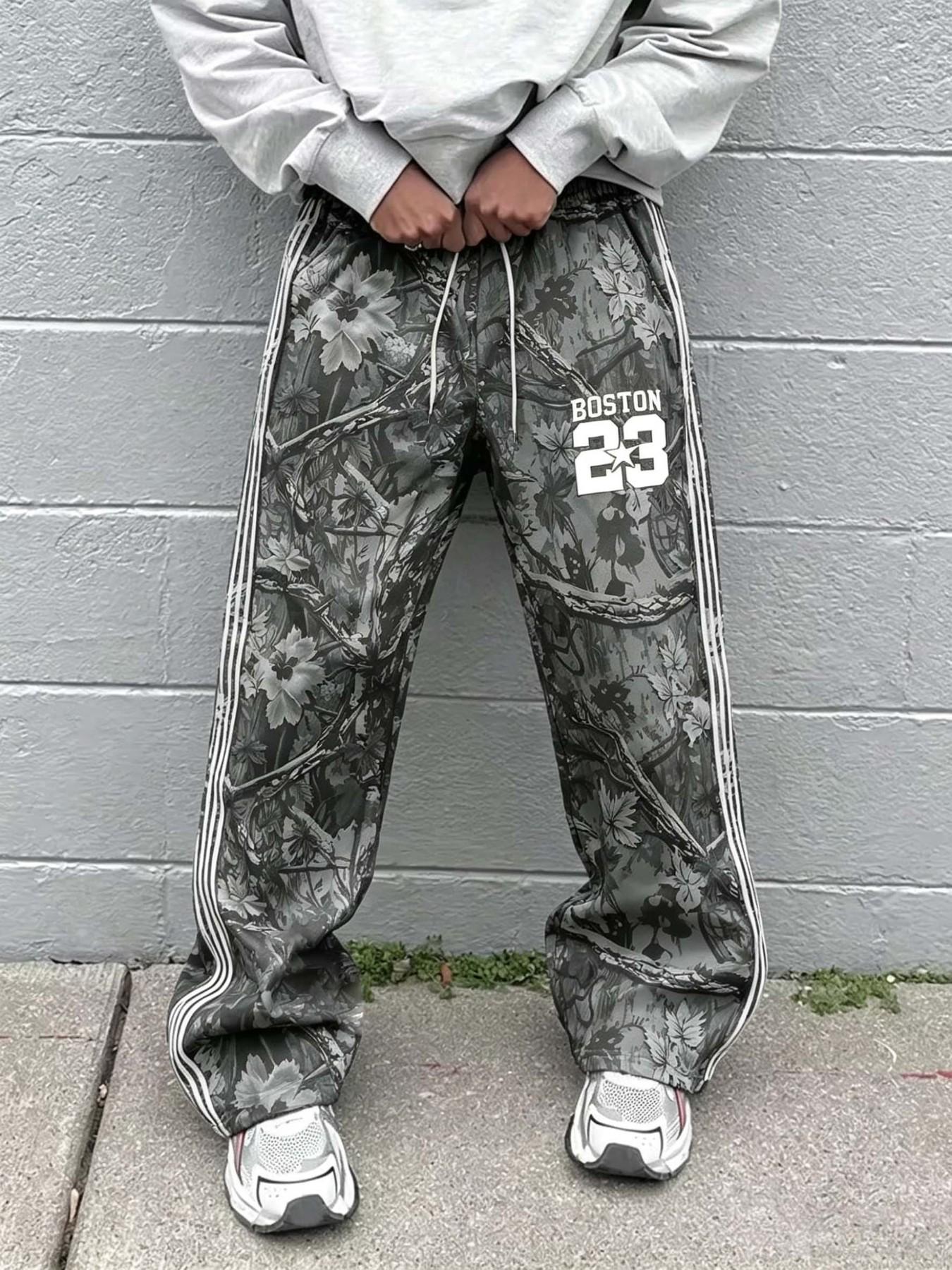 🔥 Virus Boston 23 Camouflage Tracking Pants 🔥|  Essential Y2K streetwear! Unique forest camouflage print with 3 stripe details and "BOSTON 23" logo | Comfortable wide leg fit, perfect for street style and daily styling 🔥